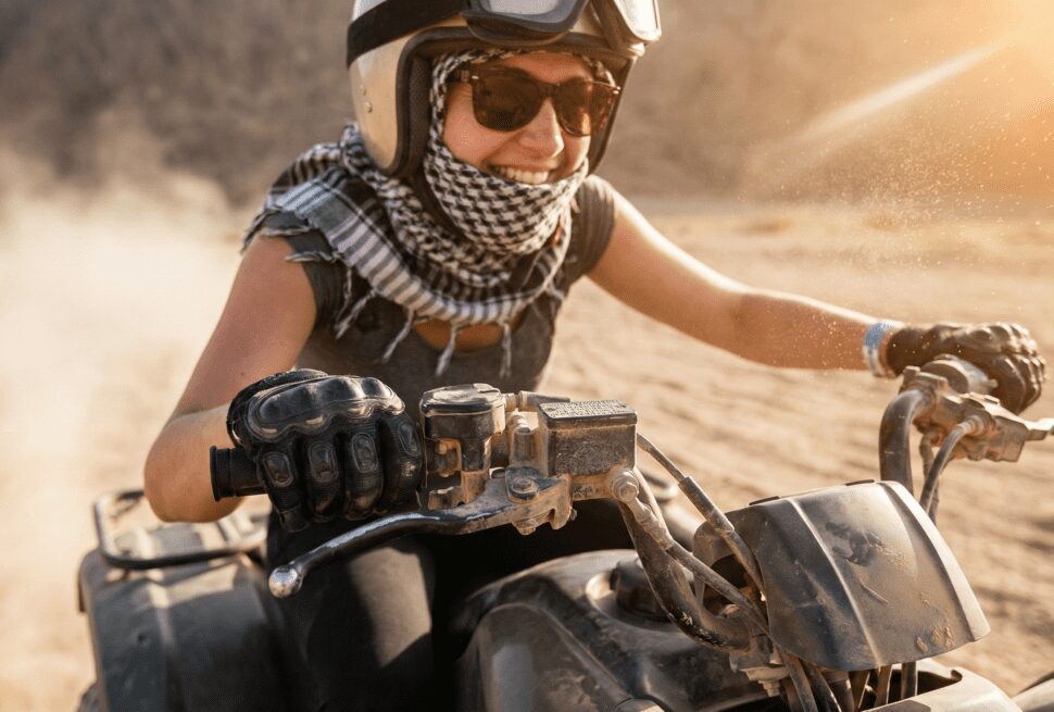Tourist enjoying a Quad Bike Safari Hurghada desert trip