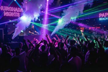 Vibrant Hurghada nightlife scene 2026 showing Marina clubs, best bars, and tourists enjoying the evening.